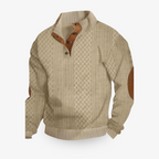 Veste en tricot gris pour homme avec motif à losanges, coudières marron, col montant, manches longues. Mode masculine élégante et moderne.