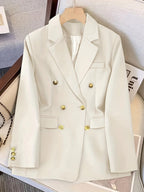 Blazer femme à double boutonnage doré, col à revers et poches à rabat 10